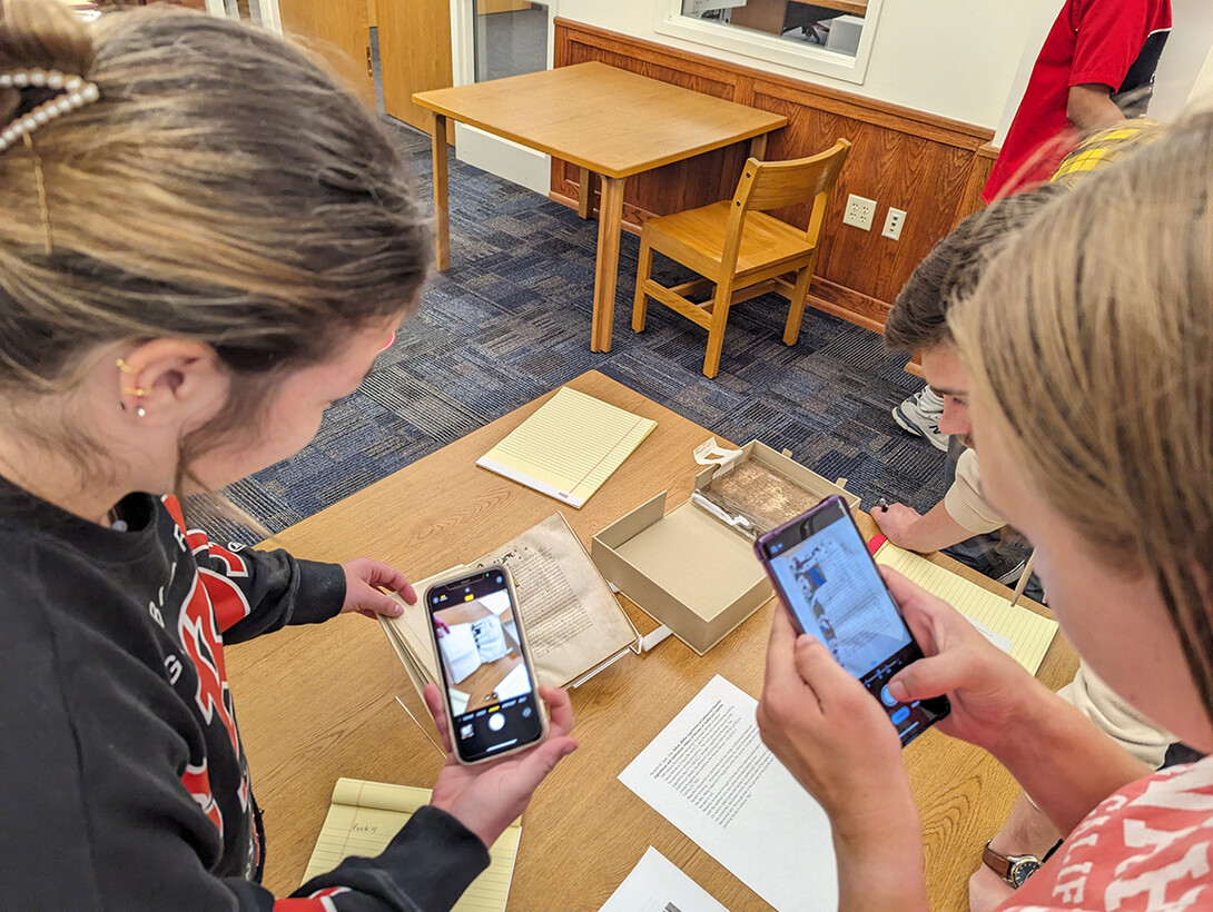 Medieval history students view manuscripts from Middle Ages at UNL Archives