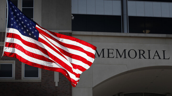 American flag in front of Memorial Stadium