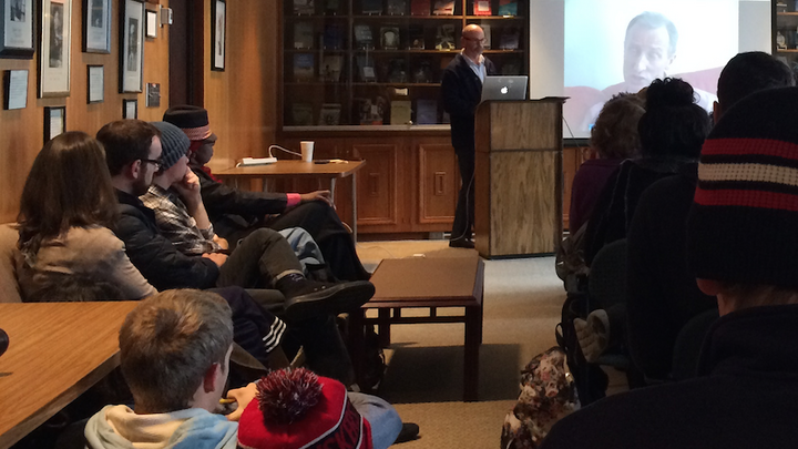 James Le Sueur (at podium) used selected interviews to show the power of intellectual Muslims against radical Islam during a standing-room-only presentation in Andrews Hall on Dec. 8.